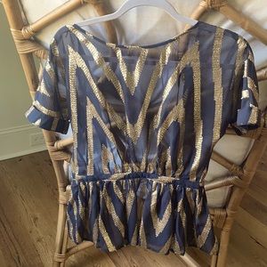 Sheer blouse w/ zip closure & tie at neck